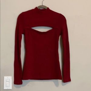 Sleek deep red top with chest cutout